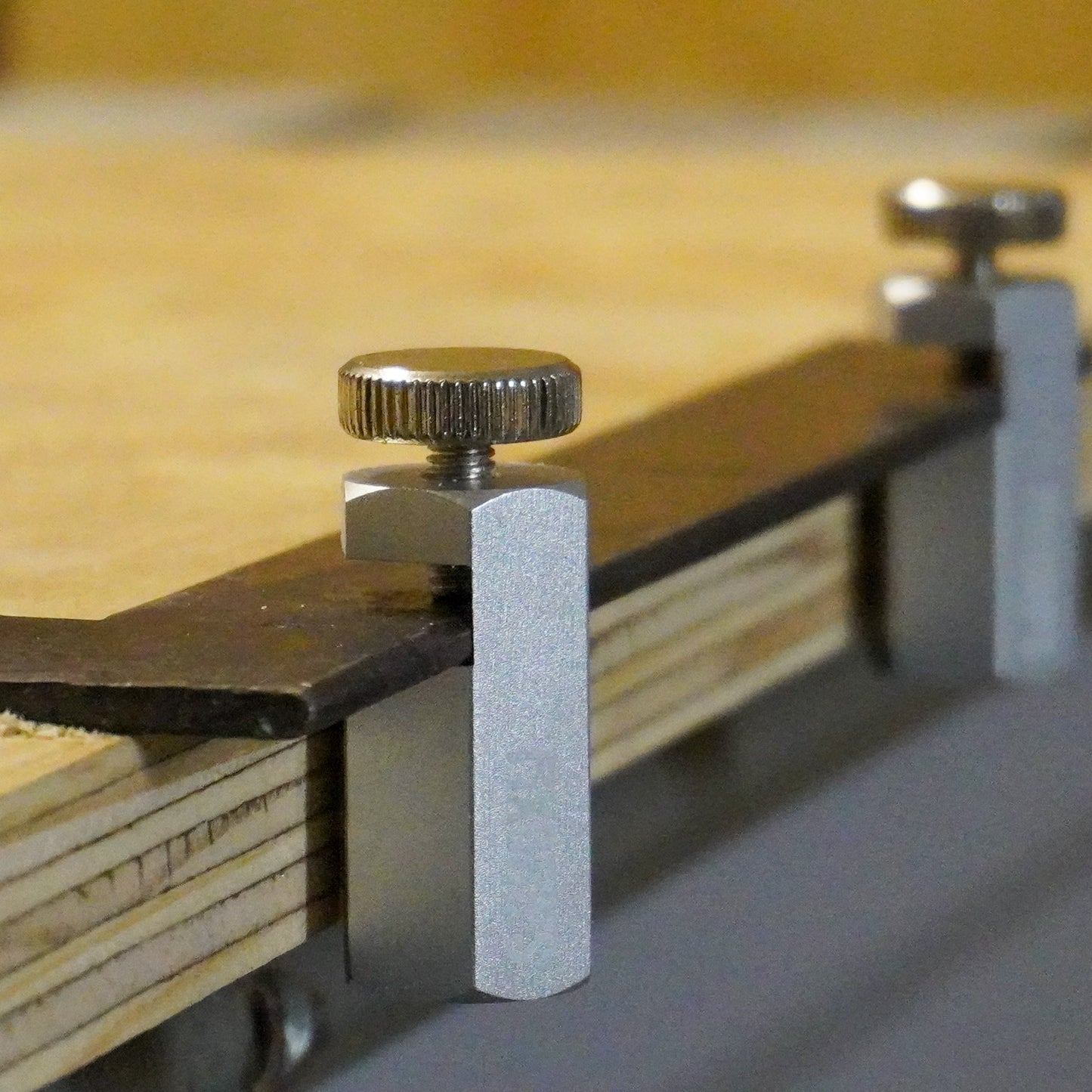 FixGrips, alignment aids for carpenter's squares, circular saws, and squares with stop